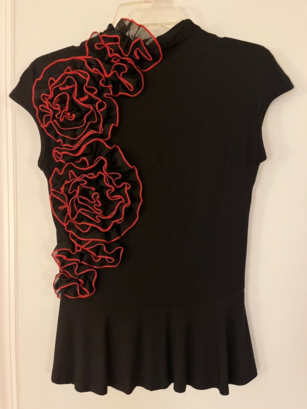 Gracia Black Top with Red Trim Rosette Accent